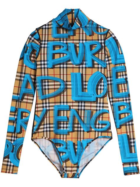 burberry blue graffiti bodysuit.